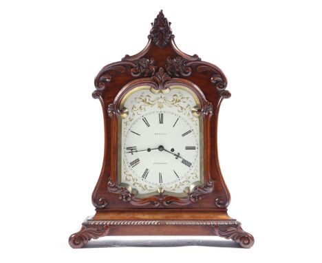 A George IV mahogany mantel clock by Roskell of Liverpool, the eight day brass movement with four turned pillars and an ancho