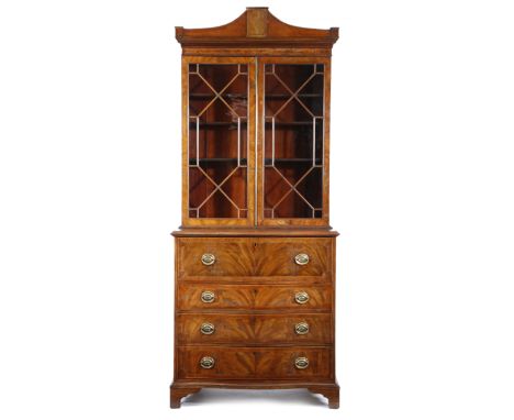 A late George III mahogany secretaire bookcase, inlaid with stringing, the detachable pagoda shape cornice above a pair of ge