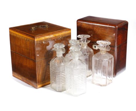 A George III fiddleback mahogany decanter case, with satinwood banding and inlaid with a marquetry conch shell, the hinged li