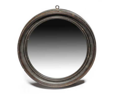 Naval interest. A William IV ebonised concave shaving wall mirror by Jacob Abraham, the circular plate within a moulded frame