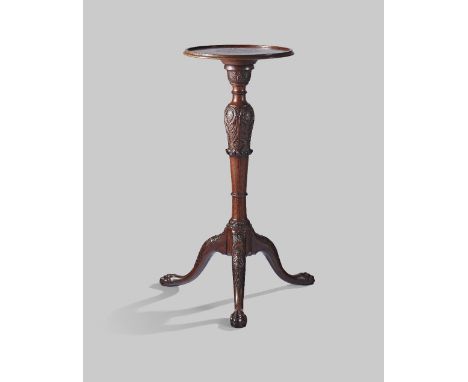 λ&nbsp;A rare George II rosewood torchere or candlestand, the circular dished top with a moulded edge, above a turned acanthu