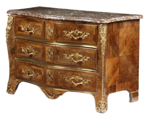 λ&nbsp;A Louis XV rosewood serpentine commode attributed to Francois Lebesgue, with later ormolu mounts with female masks, wi