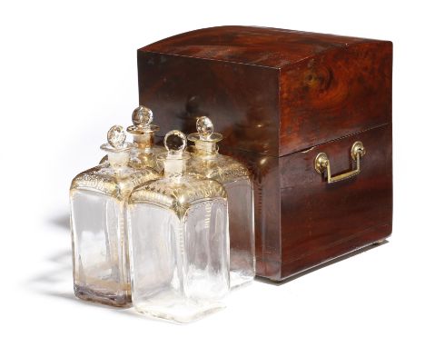 An early 19th century mahogany decanter box, with a mother of pearl escutcheon and a pair of brass carrying handles, the inte