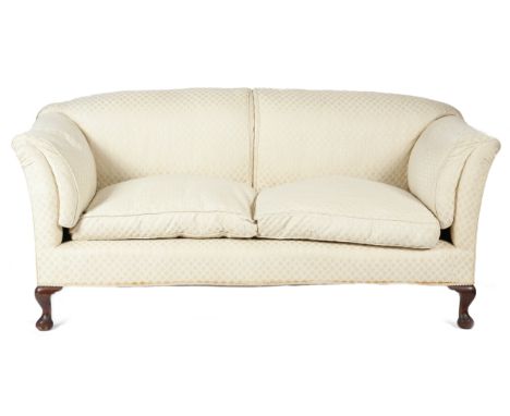 A two seater sofa by Howard &amp; Sons Ltd., later upholstered with ivory lattice design fabric, on mahogany cabriole legs an