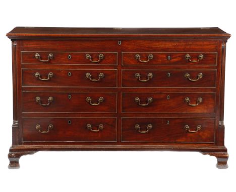 A George III Lancashire mahogany  mule chest, the hinged top revealing a vacant interior, above four false drawer fronts and 
