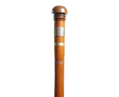 Naval interest. An Australian teak walking cane, made from the wood of 'H. M. A. S. Sydney', the handle inset with a blue met