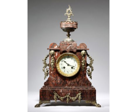 A late 19th century French rouge griotte marble mantel clock, the eight day brass cased drum movement with an outside countwh