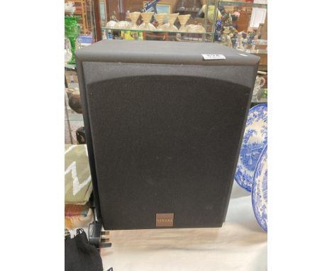 A Yamaha SW-P40 speaker