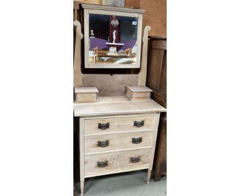 A mirrored dressing table with 3 drawers and two trinket boxes on short turned legs 160 x 76 x 45cm