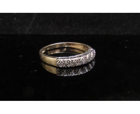 A 9ct gold diamond half hoop ring. Size P, 1.6g