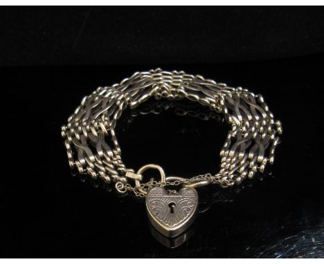 A 9ct gold gate bracelet with padlock clasp, 25.3g