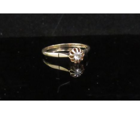 A gold ring set with single diamond in basket mount, stamped 9ct. Size N, 2.4g