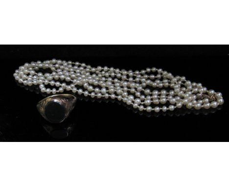 A gold bloodstone signet ring, unmarked 3.2g, and a single strand pearl necklace, 102cm long