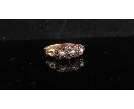 A 15ct gold pearl and green stone ring. Size O, 1.6g