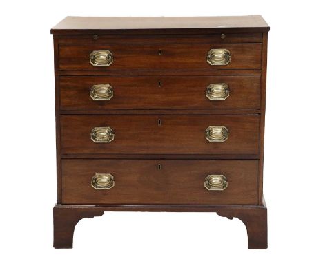 A George III Mahogany and Crossbanded Straight-Front Chest of Drawers, late 18th century, the crossbanded top above a pull-ou
