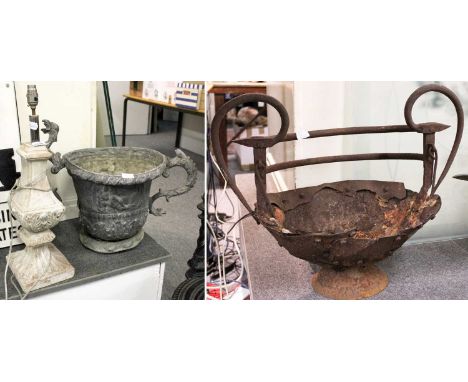 A Weathered Iron Twin Handled Urn, 48cm high, a lead twin handled urn, 46cm high, and a modern terracotta lamp base (3)