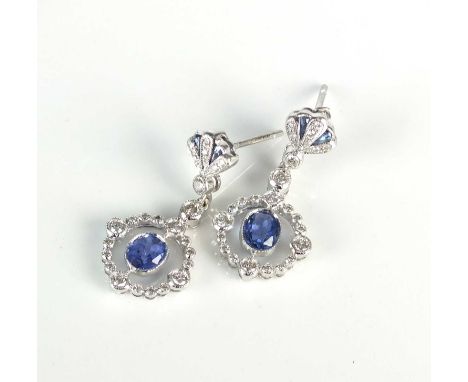 A pair of Edwardian style 18ct white gold sapphire and diamond ear pendants, each designed as a central oval mixed cut sapphi
