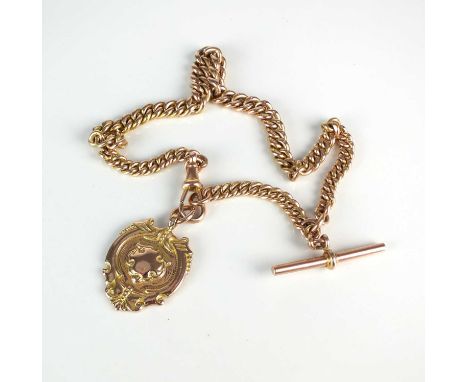 A 9ct rose gold graduated curb link Albert, with attached T-bar and swivel and suspending 9ct rose gold fob, 32cm long, weigh