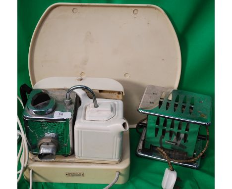 A vintage retro kitchenalia Goblin Teasmade along with a small vintage Kenwood heater .

Cost to post within the uk is £15.99