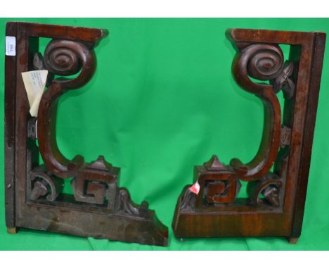 A pair of rosewood Oriental style shelf brackets / book ends.

Cost to post within the uk is £15.99+ VAT on a tracked and rec
