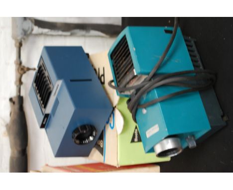 Two vintage slide projectors one in original box .

Cost to post within the uk is £15.99+ VAT on a tracked and recorded 
serv