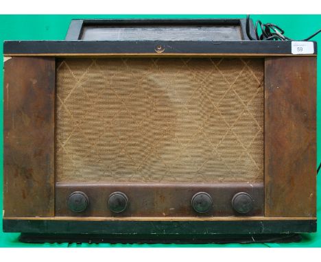 A retro Philip's electrical type 671a cased vintage valve radio.

Cost to post within the uk is £15.99+ VAT on a tracked and 