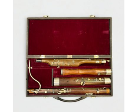 Hawkes &amp; Son Makers London Bassoon. Circa late 19th century. Two parts marked with the same serial number. With a beautif