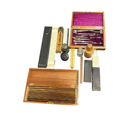 Interesting technical drawing range to include; cased technical drawing instruments set in wooden box, cased wooden rules / r