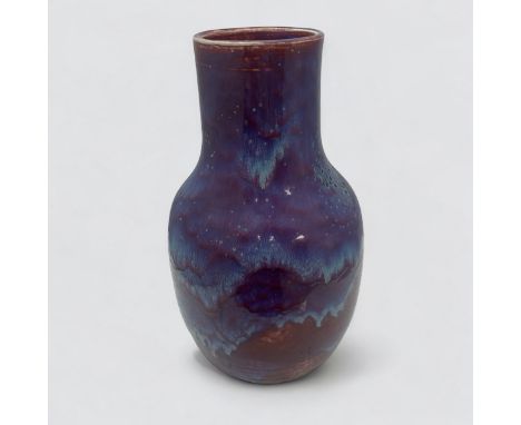 Ruskin, a Ruskin Pottery large globe and shaft early 20th Century High Fired speckled vase in a sang de boeuf glaze with blue