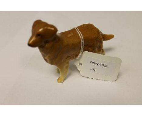 A Beswick Figure : Retriever, model 1855, gloss, light brown, height 8.3 cm. 