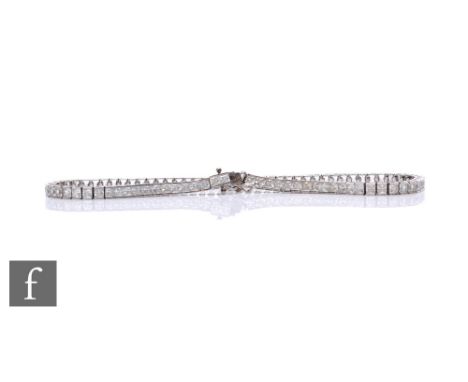 A 9ct white gold cubic zirconia tennis bracelet weight 6g, length 19cm, terminating in tongue and box fastener.