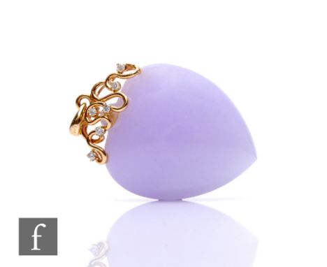 A heart shaped lavender jade pendant set with six diamonds to a 14ct scroll pediment, length 40mm.