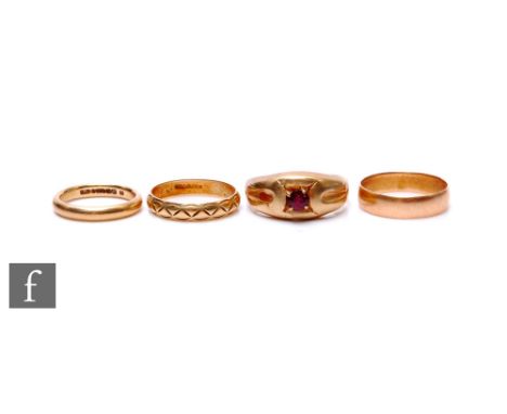 Three 9ct hallmarked rings to include two wedding rings, total weight 10.5g, with a further unmarked ring. (4)
