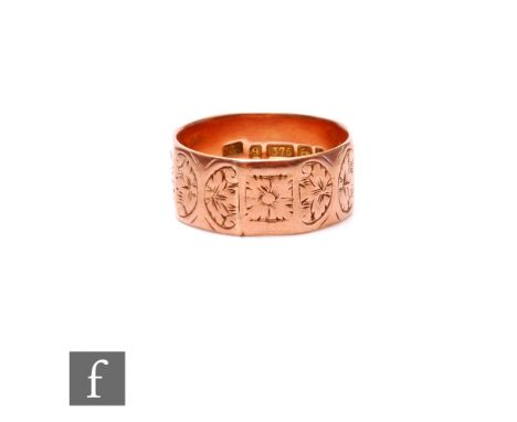 A 9ct rose gold wedding ring with engraved orange blossom detail to panelled sided, weight 5.5g, ring size P, Birmingham 1900