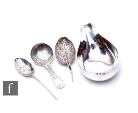 A George II hallmarked silver pap boat, length 10cm,London 1765,&nbsp;William Kersill, with two caddy spoons and a mote spoon
