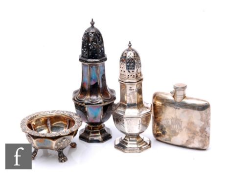Four items of hallmarked silver, two sugar castors, a hip flask and an open salt, total weight 19oz, various dates and styles
