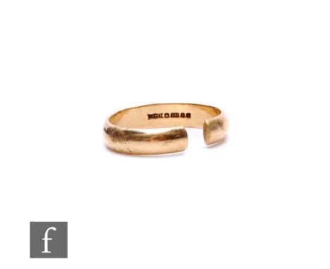 A 9ct hallmarked D shaped wedding ring, weight 4.4g, cut.