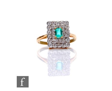 An 18ct emerald and diamond cluster ring, central emerald, length 4.5mm, claw set within a two row border of diamonds, total 