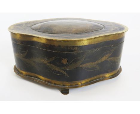 A 19th century continental possibly Russian, brass and niello trinket box, of cartouche-shaped outline, the hinged lid decora