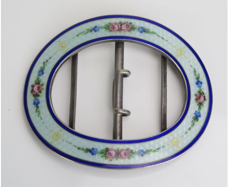 A French silver and enamel belt buckle, stamped marks of oval outline, 8cm wide.