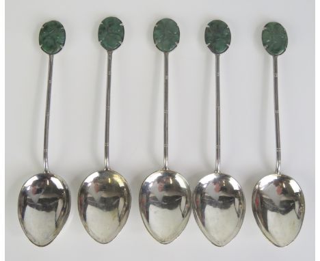 A set of five Chinese silver coffee spoons, with jade inset terminals,