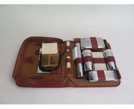 A Gent's Leather Cased Travelling Shaving Kit and a Mascot musical compact (A/F)