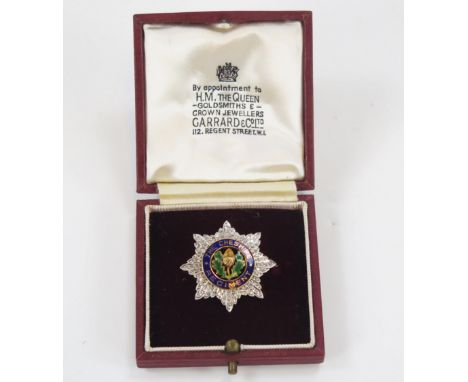 A 9ct gold, white gold, enamel and diamond set Cheshire Regiment sweetheart brooch, maker Garrard &amp; Co, Birmingham, 1990,