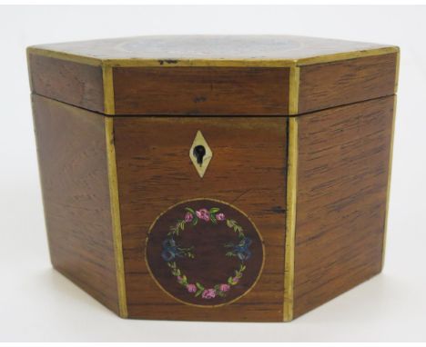 A 19th century mahogany and boxwood strung tea caddy of lozenge outline, with painted floral roundels, the hinged lid enclosi