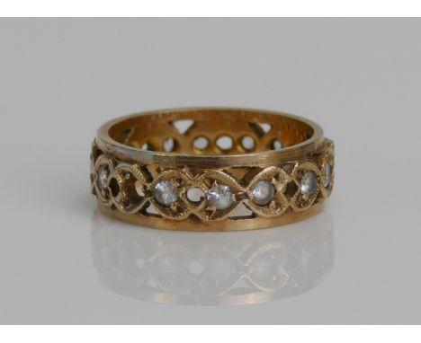 A 9ct Gold and CZ Eternity Ring, c. 5.8mm wide, size K.2t, hallmarked, 3.4g