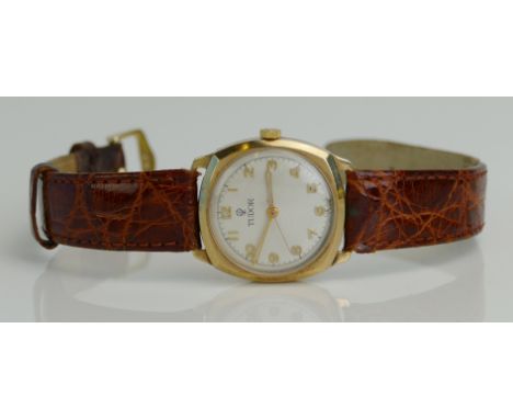 A Tudor 9ct Gold Wristwatch, the 28.75mm case with an engine turned white dial having Arabic numerals, Tudor 15 ruby manual w
