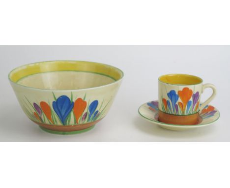 A Clarice Cliff 'Crocus' pattern coffee can and saucer together with a matching sugar basin.