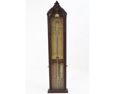 An oak cased Admiral Fitzroy barometer by J.J.Bettle Petersfield, with printed paper scale, thermometer and hygrometer, 111cm