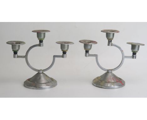 A pair of art deco period chrome and Bakelite twin branch candelabra, 17cm high.