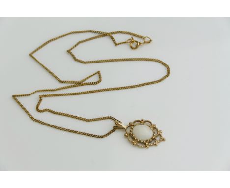 A 9ct Gold and Opal Pendant (26.35mm drop, hallmarked, 2g) and on a 9ct gold chain (46cm, import marks, 2.38g)
